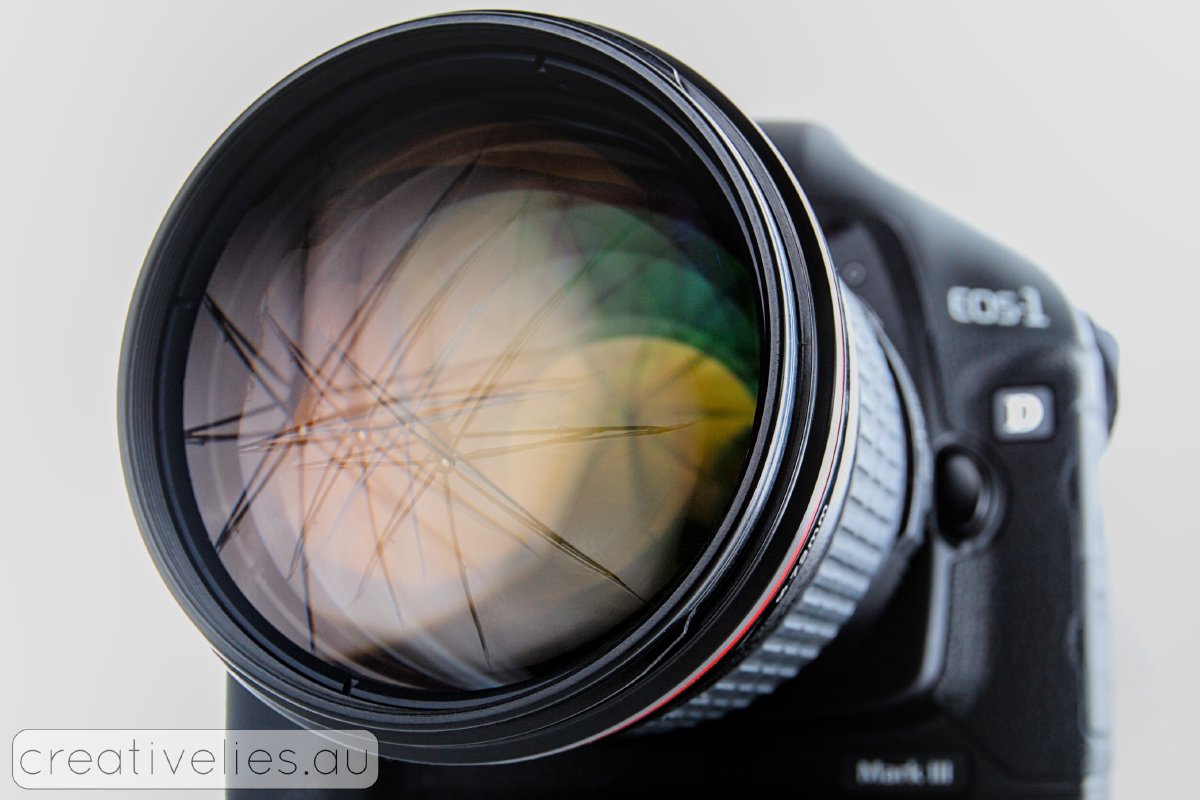 The 135L, mounted on a 1D Mark III, shot with the 24-70L on a 20D.
